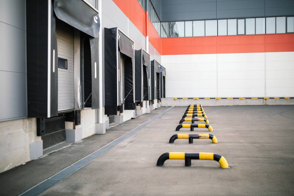 Torsieveren bedrijfsdeuren en garagedeuren